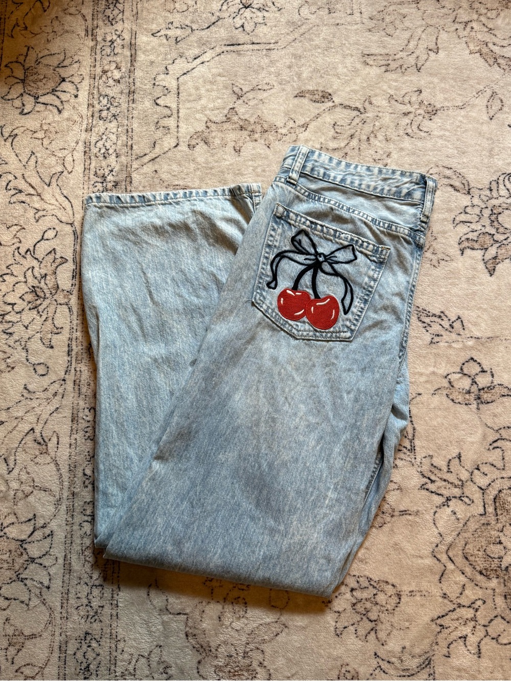 Light Wash Straight Leg Jeans with Cherry Pocket Detail